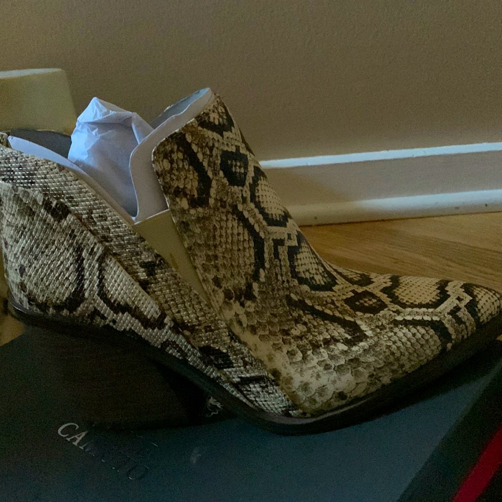 Beautiful snake print bootie .